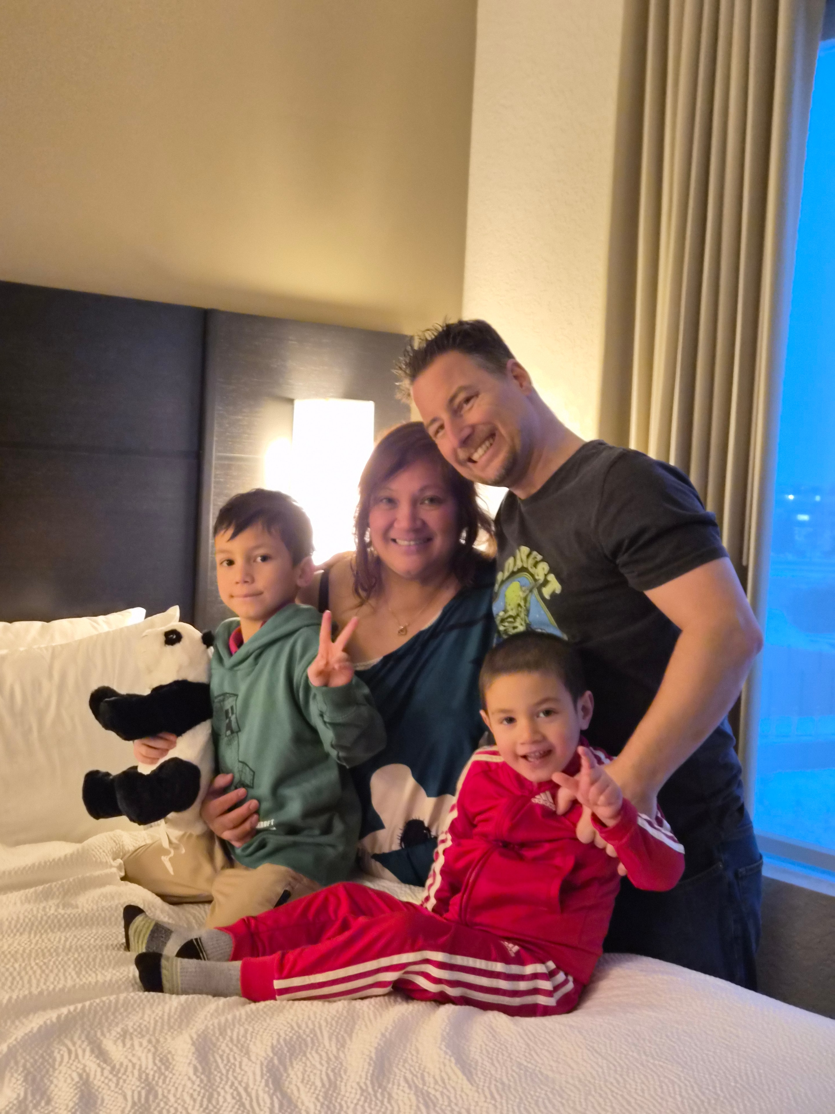 Christine with her family — her partner and their two boys